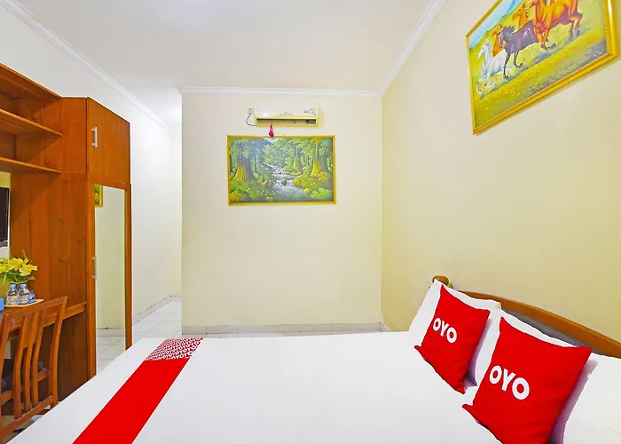 Capital O 91406 Agus Jaya Hotel