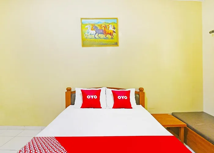 Capital O 91406 Agus Jaya Hotel